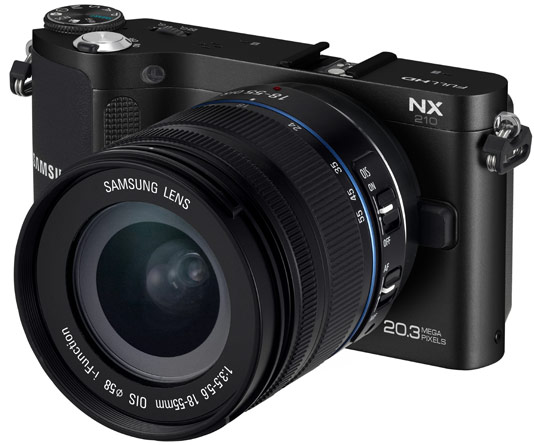 Samsung NX210 at £749 and $900