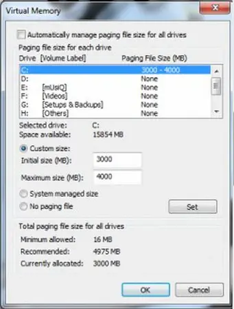 Settings under Performance - Advanced - Change under virtual memory