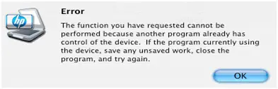 The function you have requested cannot be performed because another program already has control of the device. If the program currently using the device, save any unsaved work, close the program, and try again